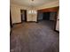 Bright living room features decorative trim and an open layout at 1001 S Anderson St, Elwood, IN 46036