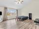 Bright bedroom with vaulted ceiling and laminate flooring at 10827 Putnam Pl, Carmel, IN 46032