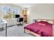 Bedroom with a large window and plenty of space for a desk and bedroom furniture at 10827 Putnam Pl, Carmel, IN 46032