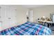 Bedroom with a large closet and space for a desk at 10827 Putnam Pl, Carmel, IN 46032