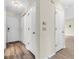 Inviting foyer with tile flooring, coat closet, and front door at 10827 Putnam Pl, Carmel, IN 46032