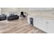 Cozy living room with gas fireplace and laminate flooring at 10827 Putnam Pl, Carmel, IN 46032