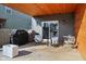 Inviting backyard patio with grill, seating, and string lights, creating a perfect outdoor living space at 139 Mckim Ave, Indianapolis, IN 46201