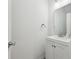 Clean half-bathroom features a white vanity, modern sink, and updated fixtures at 139 Mckim Ave, Indianapolis, IN 46201