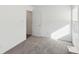 Bright bedroom with a large window offering plenty of natural light at 139 Mckim Ave, Indianapolis, IN 46201