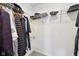 Spacious walk-in closet with ample shelving and hanging space for organized storage at 139 Mckim Ave, Indianapolis, IN 46201