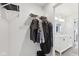 Walk-in closet featuring wire shelving and hanging racks, with convenient access to the bathroom at 139 Mckim Ave, Indianapolis, IN 46201