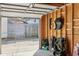 Bright garage showcasing an open door revealing the alleyway and wood-paneled interior, with stored items visible at 139 Mckim Ave, Indianapolis, IN 46201