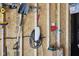Well-organized garage interior featuring tools, Tesla charger, and storage, perfect for hobbyists and car enthusiasts alike at 139 Mckim Ave, Indianapolis, IN 46201