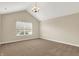 The spacious bedroom is well-lit with neutral walls, and a ceiling fan at 13902 Rue Royale Ln # 62, McCordsville, IN 46055
