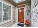 Stylish front door with decorative sidelight and lovely stone details at 13902 Rue Royale Ln # 62, McCordsville, IN 46055