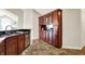Charming kitchen features wood cabinets, stainless steel appliances, and a functional layout at 13902 Rue Royale Ln # 62, McCordsville, IN 46055