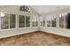 Bright sunroom with many windows allows for ample natural light and views of the outdoors at 13902 Rue Royale Ln # 62, McCordsville, IN 46055