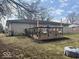 Backyard featuring a spacious deck with outdoor seating, perfect for entertaining and relaxing at 2104 W Barcelona Dr, Muncie, IN 47304