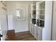 Hallway with modern shelving and cabinets, with a space for storing a toaster and stand mixer at 2104 W Barcelona Dr, Muncie, IN 47304