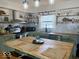 Bright kitchen featuring an island with butcher block countertops, stainless steel appliances, and lots of storage space at 2104 W Barcelona Dr, Muncie, IN 47304