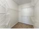 Walk-in closet with wire shelving and carpet flooring at 2218 Colfax Ln, Indianapolis, IN 46260