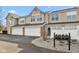 Attractive townhomes featuring a large driveways and beautiful landscaping at 2218 Colfax Ln, Indianapolis, IN 46260