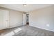 Neutral bedroom featuring carpet, white trim, and bright natural light at 2308 Nowland Ave, Indianapolis, IN 46201