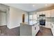Contemporary kitchen featuring an island, stainless steel appliances, and hardwood floors at 2308 Nowland Ave, Indianapolis, IN 46201