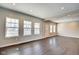 Bright living room featuring sleek hardwood floors, recessed lighting, and classic architectural details at 2308 Nowland Ave, Indianapolis, IN 46201