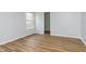 A bedroom featuring wood-look flooring and a view into the closet at 3113 Cassara Dr, Indianapolis, IN 46203