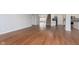 Spacious living room boasts hardwood floors and neutral paint, offering a blank canvas to personalize at 3113 Cassara Dr, Indianapolis, IN 46203