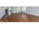 An open living room showcases wood flooring and natural light at 3113 Cassara Dr, Indianapolis, IN 46203