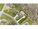 An aerial view shows a home with a swimming pool and well-manicured lawn at 34 Gettysburg, Coatesville, IN 46121