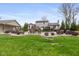 Large backyard featuring an in-ground pool, deck, patio, and plenty of green space at 34 Gettysburg, Coatesville, IN 46121