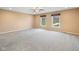 Spacious bedroom with neutral carpet and paint and bright, sun-filled windows at 34 Gettysburg, Coatesville, IN 46121