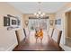Inviting dining room featuring modern decor, large table, and lots of natural light at 34 Gettysburg, Coatesville, IN 46121