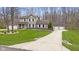 Traditional two-story home with an attached garage and detached garage in a treed area at 34 Gettysburg, Coatesville, IN 46121