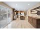 Spacious kitchen boasts stainless steel appliances, island, and sliding glass door to the outdoor deck at 34 Gettysburg, Coatesville, IN 46121