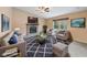 A cozy living room featuring a fireplace, plush seating, and a stylish rug at 34 Gettysburg, Coatesville, IN 46121