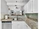 Stylish kitchen with stainless steel appliances, granite countertops, and tile backsplash at 3708 Magenta Ln # 3, Indianapolis, IN 46214
