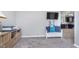 Bright room featuring a printer setup, and entry to the kitchen, providing comfortable work and living spaces at 389 Longleaf Ln, Greenfield, IN 46140