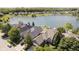 Aerial view of neighborhood homes along the lake, showcasing the community's waterfront living at 4615 Crystal Lake Dr, Indianapolis, IN 46240