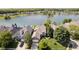 An aerial view of a home near a lakefront community and lush landscaping at 4615 Crystal Lake Dr, Indianapolis, IN 46240
