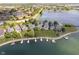 Panoramic aerial view of homes situated along a picturesque lake, perfect for boating and recreation at 4615 Crystal Lake Dr, Indianapolis, IN 46240