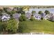 Aerial view of waterfront homes with manicured lawns and private lake access at 4615 Crystal Lake Dr, Indianapolis, IN 46240