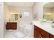 Bright bathroom featuring a soaking tub, and dual vanity at 4615 Crystal Lake Dr, Indianapolis, IN 46240