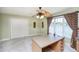 Light and airy bedroom with a ceiling fan, a view of the lake, and neutral carpet at 4615 Crystal Lake Dr, Indianapolis, IN 46240