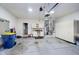 Spacious garage with plenty of storage, a workbench, and ample room for parking at 4615 Crystal Lake Dr, Indianapolis, IN 46240