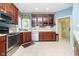 Updated kitchen with stainless steel appliances, and stylish light-blue walls at 4615 Crystal Lake Dr, Indianapolis, IN 46240