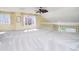 Spacious loft area with natural light and a view of the neighborhood at 4615 Crystal Lake Dr, Indianapolis, IN 46240