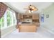 Home office featuring built-in cabinets, a desk area, and a bright window at 4615 Crystal Lake Dr, Indianapolis, IN 46240