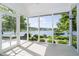 A screened porch with water views and a place to sit and relax at 4615 Crystal Lake Dr, Indianapolis, IN 46240