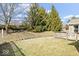 Enjoy outdoor living with a patio, lush lawn, and well-maintained landscaping at 4704 Blue Marlin Way, Indianapolis, IN 46239
