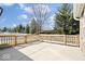 The concrete patio in backyard offers a perfect spot for relaxation and entertaining at 4704 Blue Marlin Way, Indianapolis, IN 46239